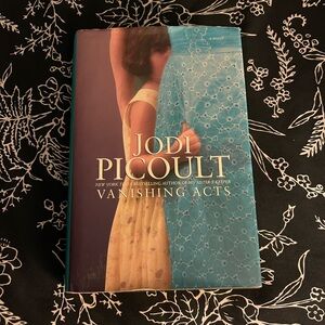 Vanishing Acts Hardcover Book